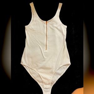 Woman’s white bodysuit tank